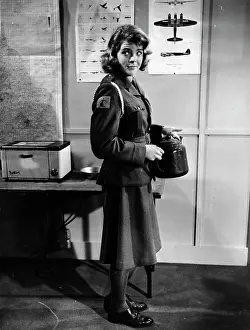 Grinham: Swimmer Judy Grinham standing in uniform