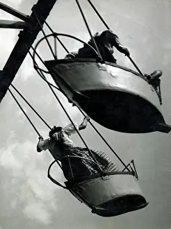 Occupants: SWING BOATS AT THE FAIR