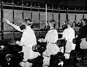 Precautionary: Switchboard operators wearing gas-masks