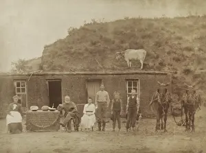 Manifest: The Sylvester Rawding family in front of sod