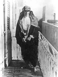 Liaison: T E Lawrence (Lawrence of Arabia) on a balcony