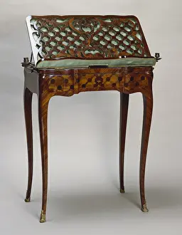 Easel: Table d'accouchee made of wood and bronze