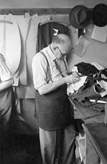 Braces: Tailor at work on a garment