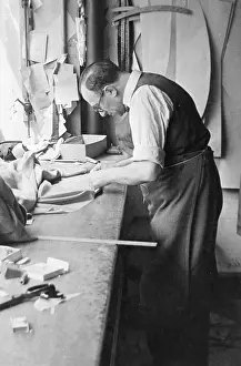 Tailoring: Tailor at work on a garment