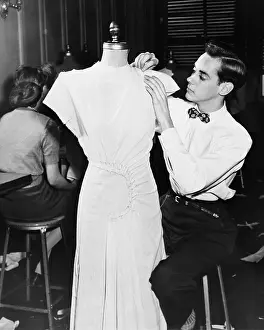 Dressmakers: Tailor working with dressmakers dummy