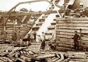 Logging: Taking logs from the river, Montmorency, Quebec, Canada