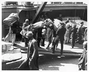 Shipboard: TAKING ON MAIL/PORT SAID