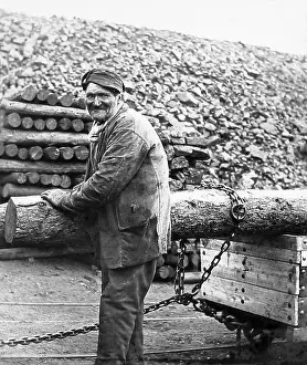 Prop: Taking a pit prop into the mine early 1900s