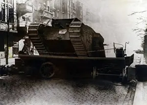 Breaks: Tank of the government forces breaks through a blockade