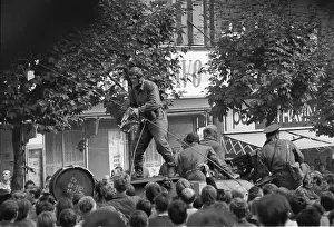 Crewman: Tank - submachine gun - soldier - protest - confrontation