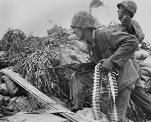 Galvanic: On Tarawa, a U.S. Marine, with a carbine and a