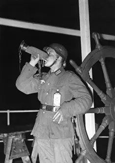 Trumpeter: Tattoo during a troop transport, 1937