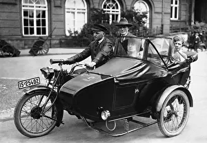 Conventional: Taxi with passengers in Berlin, 1925