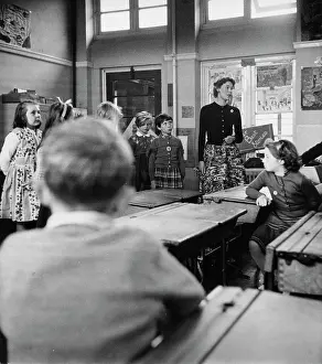 Reminiscent: Teacher with class of primary school children