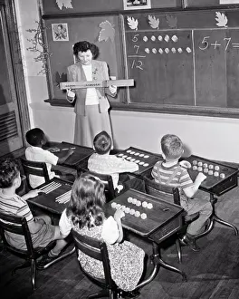 Senses: Teacher and Six Elementary Students in a Maths Class