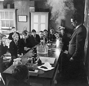 Henry Grant Collection: Teacher gives demonstration to schoolboys in a science class