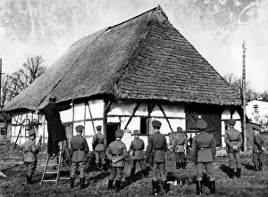 Gain: A teacher inspects settlements with soldiers of the Reic