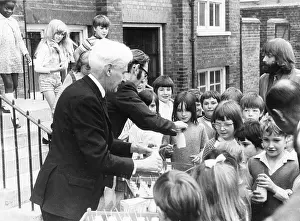 Discontinued: Teachers distributing milk to children, Woolwich, London