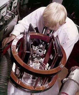 Microscope: A technician doing miniature work