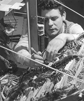 Heinz Zinram: A technician works on a wiring system