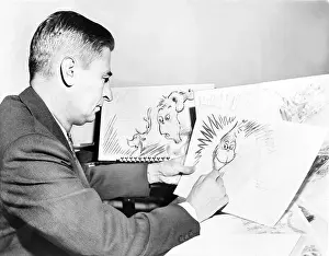 Ted Geisel (Dr. Seuss) (1904-1991) at work ?