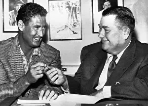 Agreeing: Ted Williams, and Tom Yawkey, owner of the ?