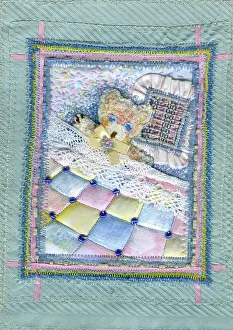 Quilt: Teddy under a pink, blue and yellow quilt