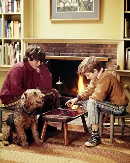 Checkers: Two Teen Boys Playing Checkers