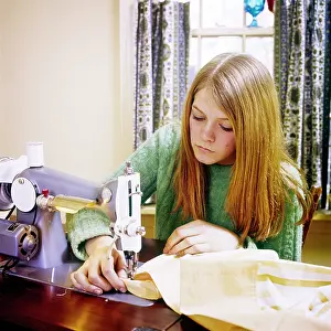 Rewarding: Teen Girl Using Sewing Machine