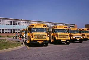 Highschool: Teenagers Boarding Buses Schoolbuses