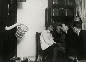 Fraudulent: Teleplasmic hand holding basket at a seance