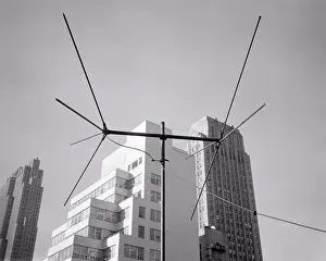 Deb001: Television Antenna Beside Tall Skyscraper