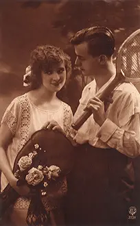 Devote: Tennis Couple posing with racquets