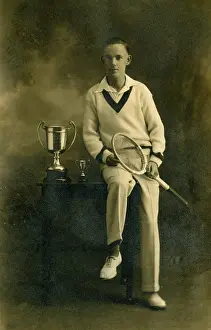 Racket: Tennis player with trophy