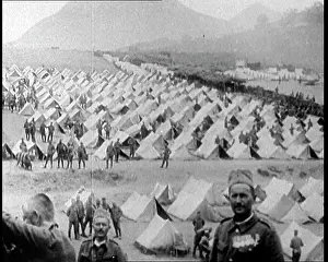 Tented: A Tented Camp In Greece. Men Are Standing About