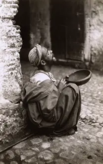 Pleads: Tetouan - Street Beggar
