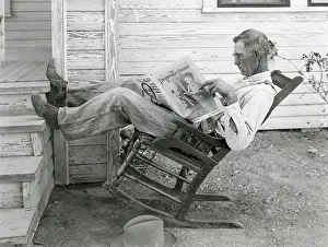 40 50 Years Old: Texas farmer reading Progressive Farmer-Southern