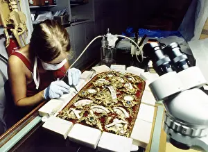 Conservator: textile conservator working