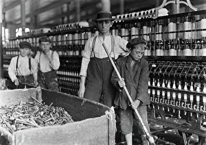 A textile mill. Sweeper and doffer boys ?