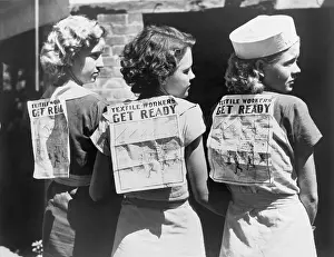 Gastonia: Textile workers displaying picket signs ?