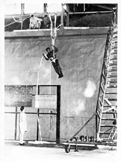 Paratroop: Thai paratroop trainee practising rapelling