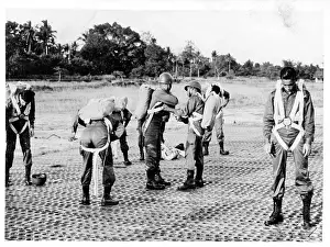 Paratroop: Thai paratroopers fitting parachutes