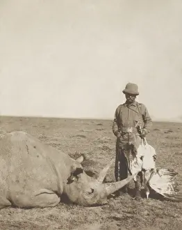 Lcgr1705: Theodore Roosevelt holding a dead bustard and standing