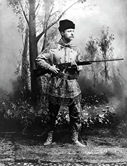 Traditionally: Theodore Roosevelt, holding a rifle while