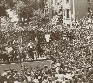 Head Of State: Theodore Roosevelt on a platform speaking to a large