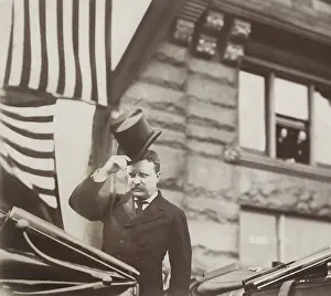 40 50 Years Old: Theodore Roosevelt tipping his hat in an open carriage