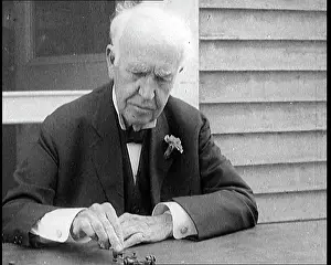 Morse: Thomas Edison Sitting At An Outside Desk and