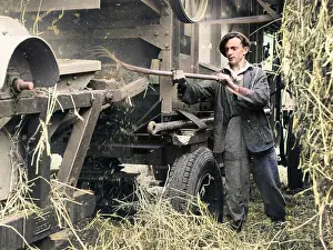 Atcolourisedpic: THRESHING MACHINE