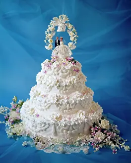Swags: Four Tier Ornately Decorated Wedding Cake Piped