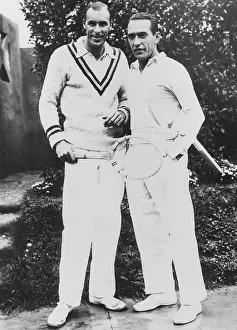 1328: Bill Tilden and Henry Cochet (right) on the courts